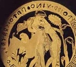 Kylix a figure rosse con motto dipinto