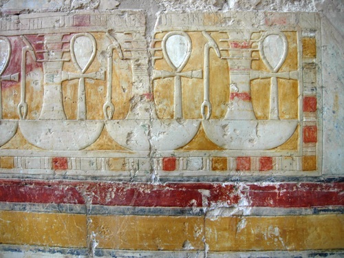 Frieze with djed-pillars ("stability"), ankh-crosses ("life") and was-sceptres ("power") on neb-basket ("Lord"), 18th dynasty, reign of Hatshepsut; Theban West Bank, Deir el-Bahri, Hathor temple